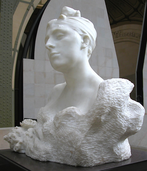 Marble bust of a woman by Rodin